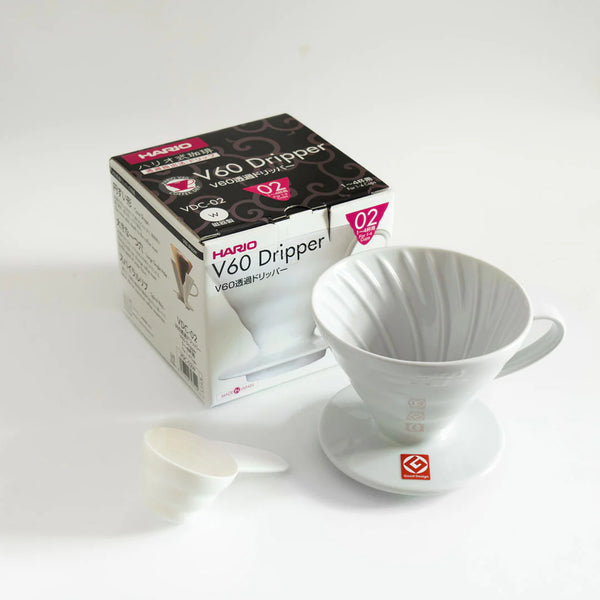 https://www.carabellocoffee.com/cdn/shop/files/hario-v60-coffee-dripper-ceramic_600x.webp?v=1693331899